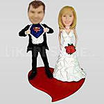 Wedding cake topper bobblehead-10701 
$153.36 
https://www.likenessme.com/wedding-cake-topper-bobblehead-10701.html